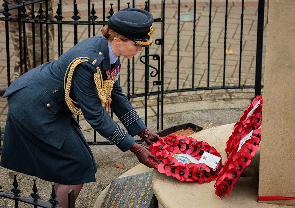 RAF Brize Norton's Group Captain Louise Henton lays a wreath at the Carterton memorial